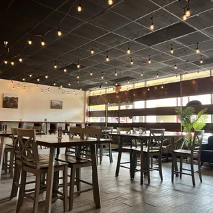 Nice tables and chairs, couches and set up.