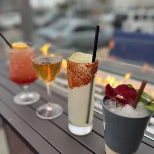 a variety of cocktails on a table