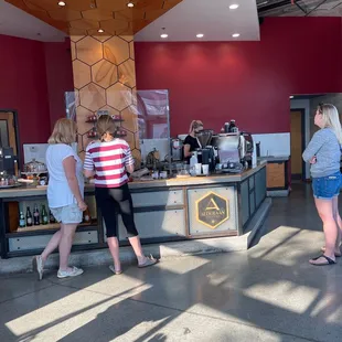 a group of people in a coffee shop