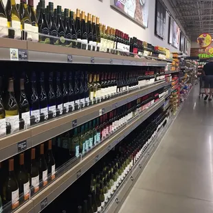 shelves of wine in a grocery store