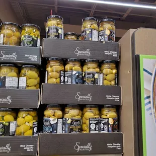 A variety of olives filled with feta, white cheddar,  jalapeno jack cheese.