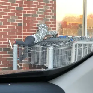 Child of person panhandling at Aldi doorstop