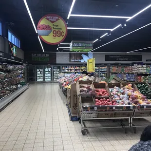 a grocery store filled with fruits and vegetables