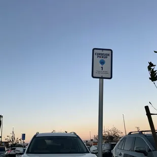 a white car parked in a parking lot