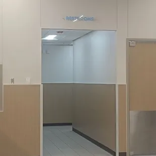 Restrooms beyond Check-out Registers