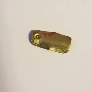 a close up of a gold plate