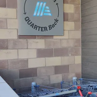 a shopping cart in front of a building