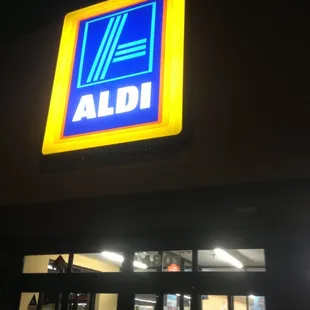 the front of a store at night