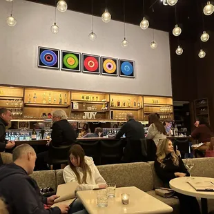 people sitting at the bar