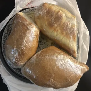Three loaves of bread included in our to go order tonight!