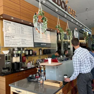 a man standing at the counter