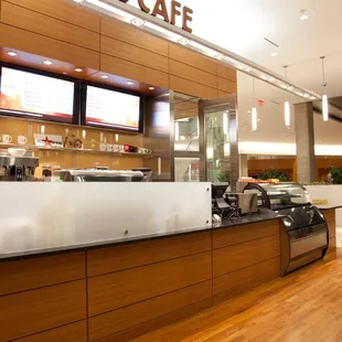 a coffee shop with a counter