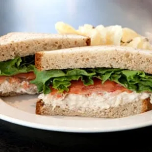 a sandwich and potato chips