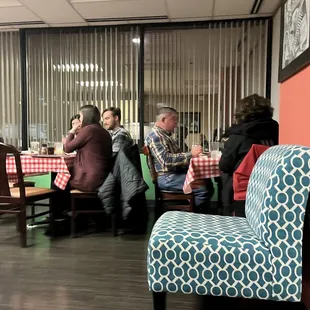 a group of people sitting at a table