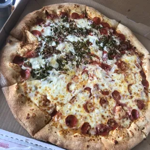 Hugggeeee 1/2 pepperoni and 1/2 meats