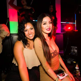 two young women posing for a picture