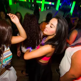 a woman dancing in a disco