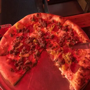 T Rex pizza with banana hot peppers!