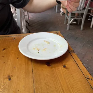Dirty plate under a clean plate