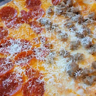 Vodka sauce with half pepperoni and half sausage.