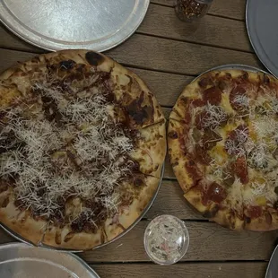 10/25/24 Our two pizzas with fresh grated parm