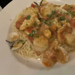 Scallops and clams over angel hair pasta