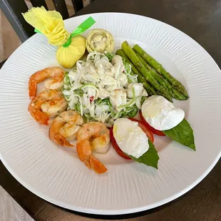Della Casa salad: chilled homemade angel hair pasta, lump crab, marinated Gulf shrimp, caprese, asparagus