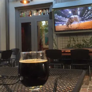 Beer and bull riding on the patio. It&apos;s hot but at least is shady!