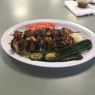 Chicken Souvlaki dinner with pita bread and Mr. Pibb.