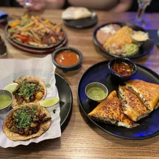 Pastor Tacos, Quesabrirra quesadilla, chicken fajitas, spicy margaritas.