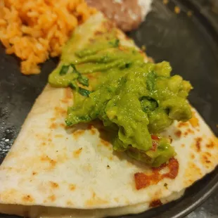Vegetable Quesadilla (3 pieces) came with rice, refried beans and a side of guacamole.