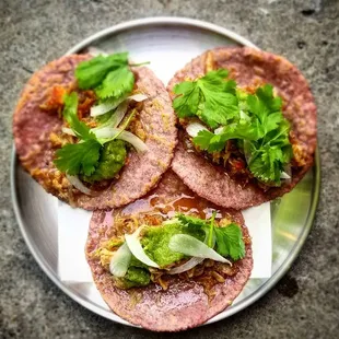 three tortillas on a plate