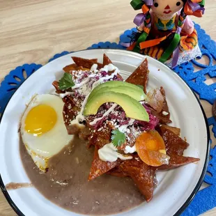 Chilaquiles with a egg with morita sauce