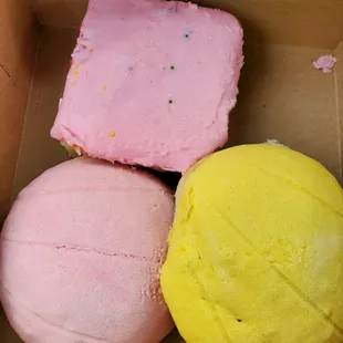 Pink cake and conchas