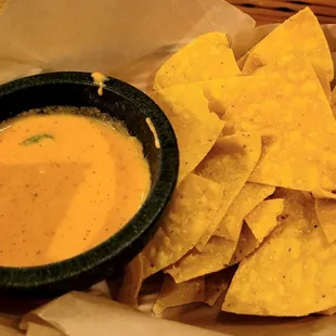 Chips and Queso Sauce (first basket is free)