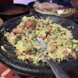 Guacamole made at the table