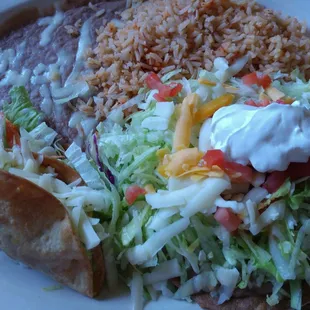 Beef taco, bean tostada combo... Was decent.