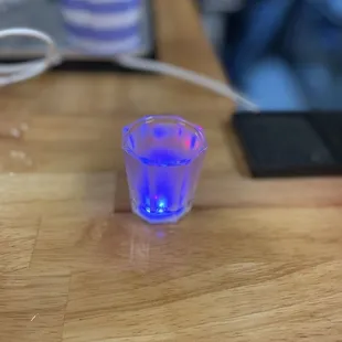 Battery lit shot of citrus infused tequila