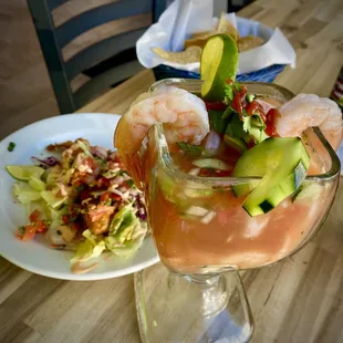 Fish taco and shrimp cocktail.