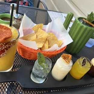 Cocktail flight, mangoneada y cerritos. We enjoyed delicious drinks in their shaded patio.