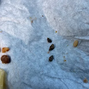 a piece of cheese and seeds