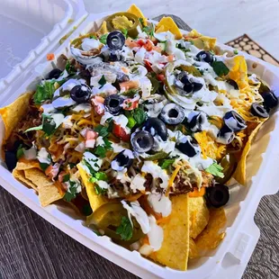 Carnitas nachos   IG: @fooddeclassified
