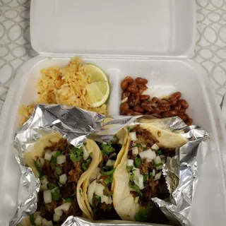 1 Carnitas and 2 Carne Asada Taco Combo Plate