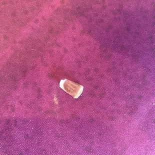 a piece of food on the floor