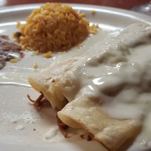Chicken enchiladas with white queso