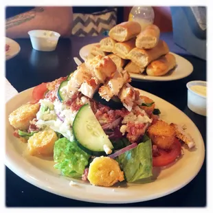 Build your own salad for $5! Chicken, bacon, mozzarella, tomatoes, cucumbers, onions and homemade croutons! And breadsticks!