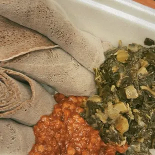 injera with some gomen and yemsir wot