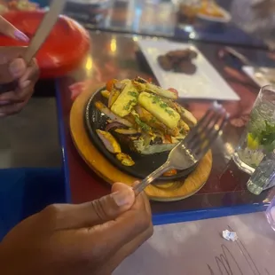 a plate of food being served
