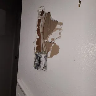 More hulk punching drywall instead of cutting it so it's easier to replace.