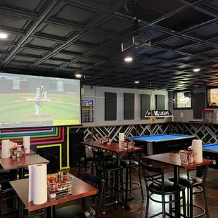 a baseball game being played on a big screen